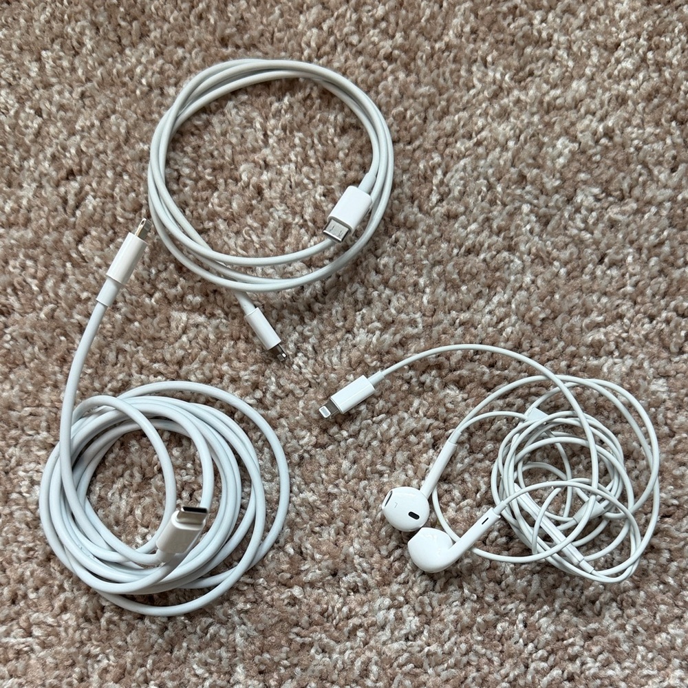 Two White USB-C to Lightning Cables & One Lightning Earbuds